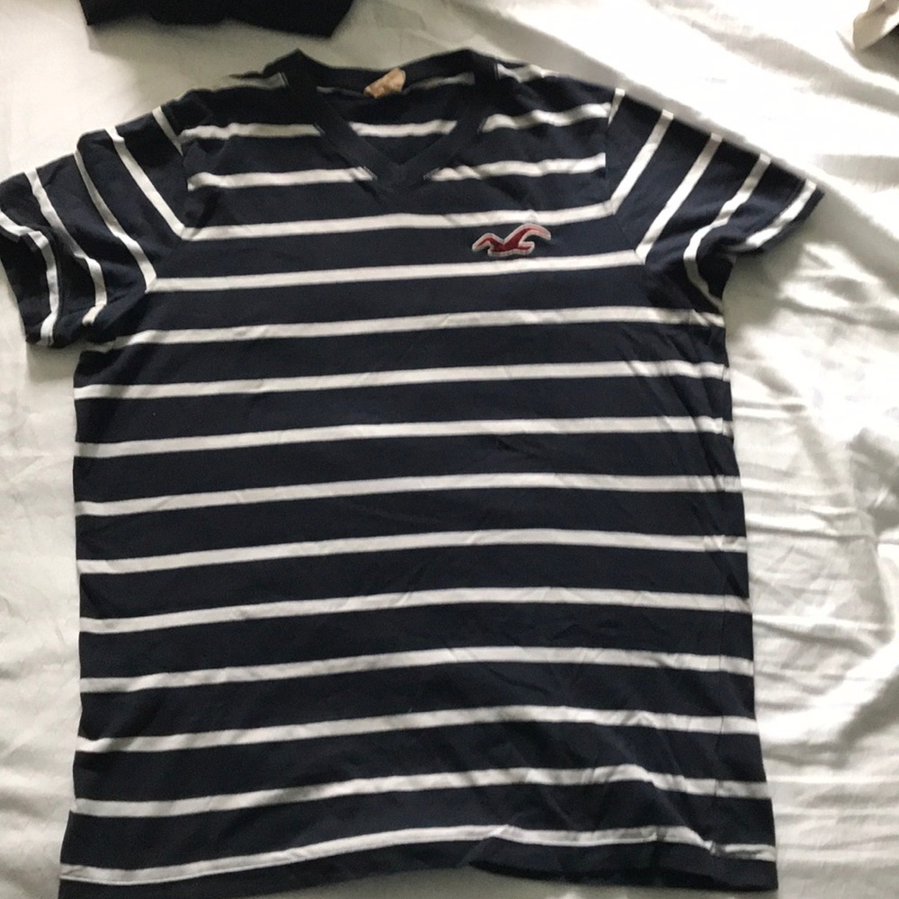Navy Hollister shirt with white stripes. L